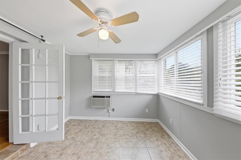 54 La Rue Place Northwest Atlanta, GA 30327 - Photo 14 of 36 a view of an empty room with a window