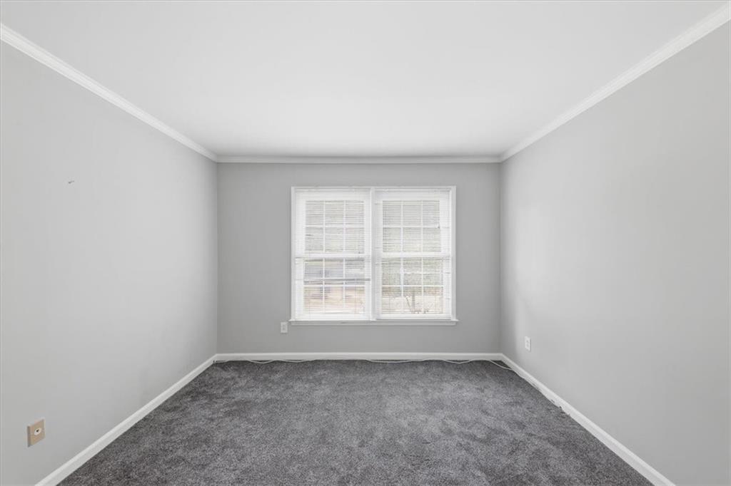 54 La Rue Place Northwest Atlanta, GA 30327 - Photo 21 of 36 an empty room with a window