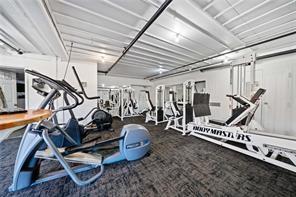 54 La Rue Place Northwest Atlanta, GA 30327 - Photo 36 of 36 a view of a room with gym equipment