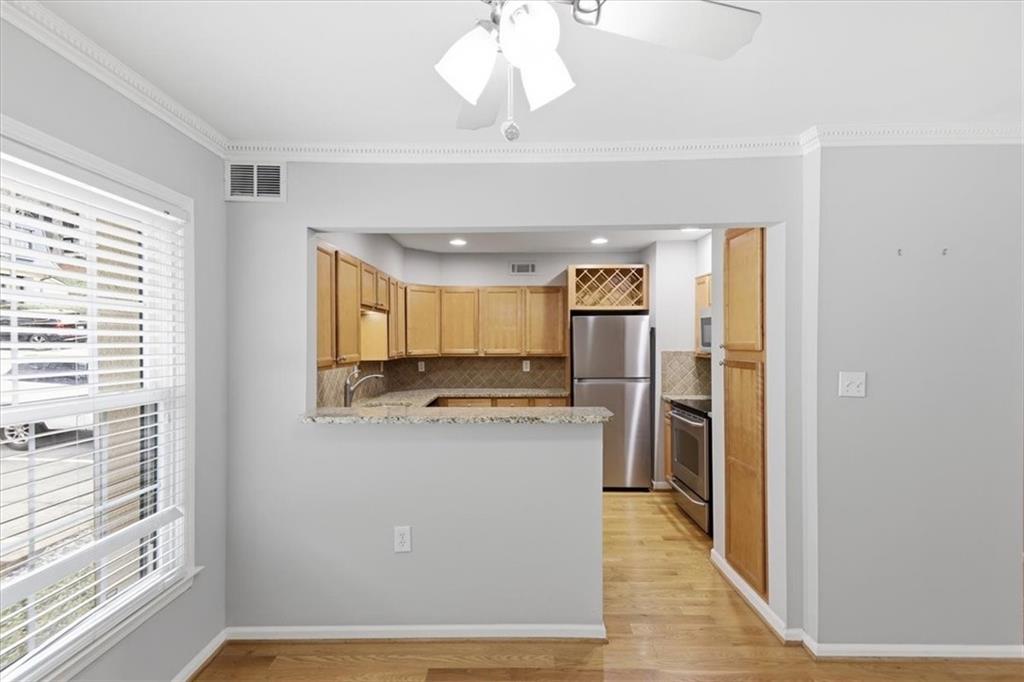 54 La Rue Place Northwest Atlanta, GA 30327 - Photo 4 of 36 a view of a kitchen with a window