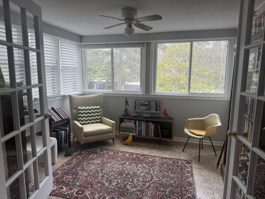 54 La Rue Place Northwest Atlanta, GA 30327 - Photo 7 of 20 a living room with furniture and a rug