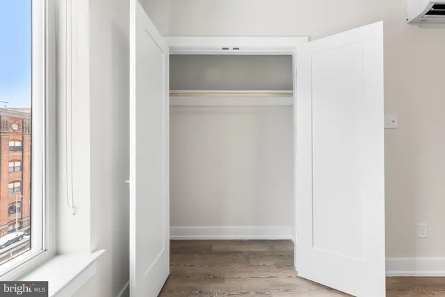 a view of a building with sitting area