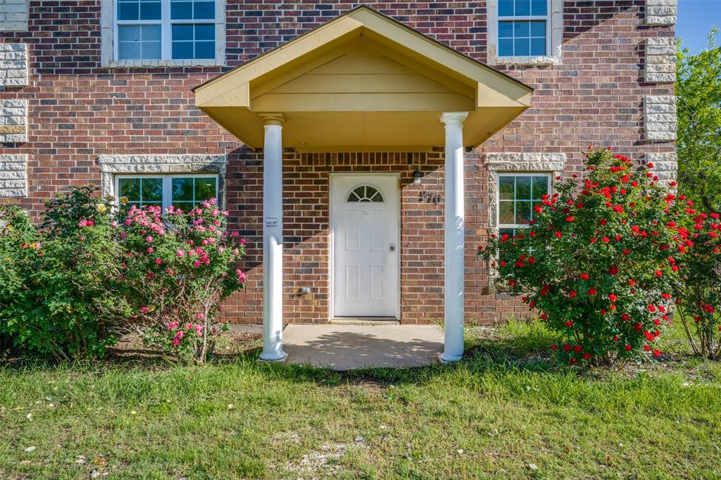 970 McReynolds Road Sanger, TX 76266 - Photo 25 of 25 a front view of a house with garden