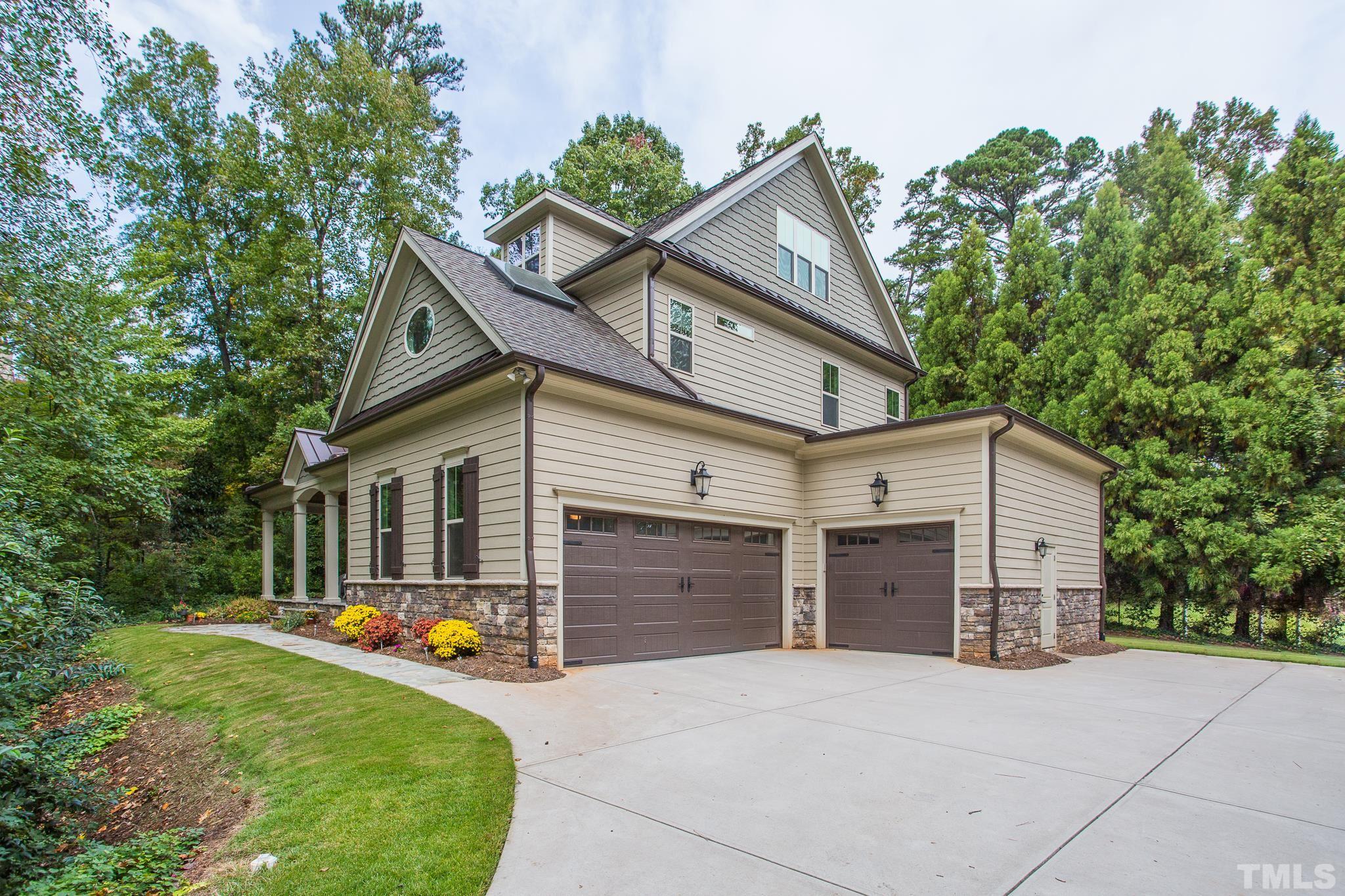 1921 Banbury Road Raleigh, NC 27608 - Photo 3 of 30 a front view of a house with yard and trees in the background