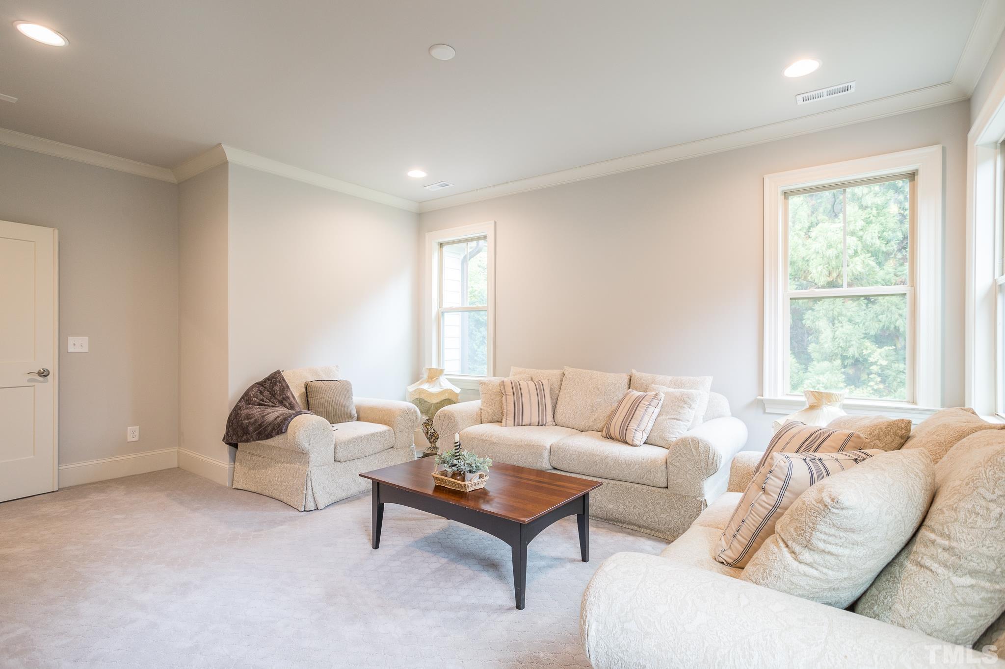 1921 Banbury Road Raleigh, NC 27608 - Photo 21 of 30 a living room with furniture and a large window