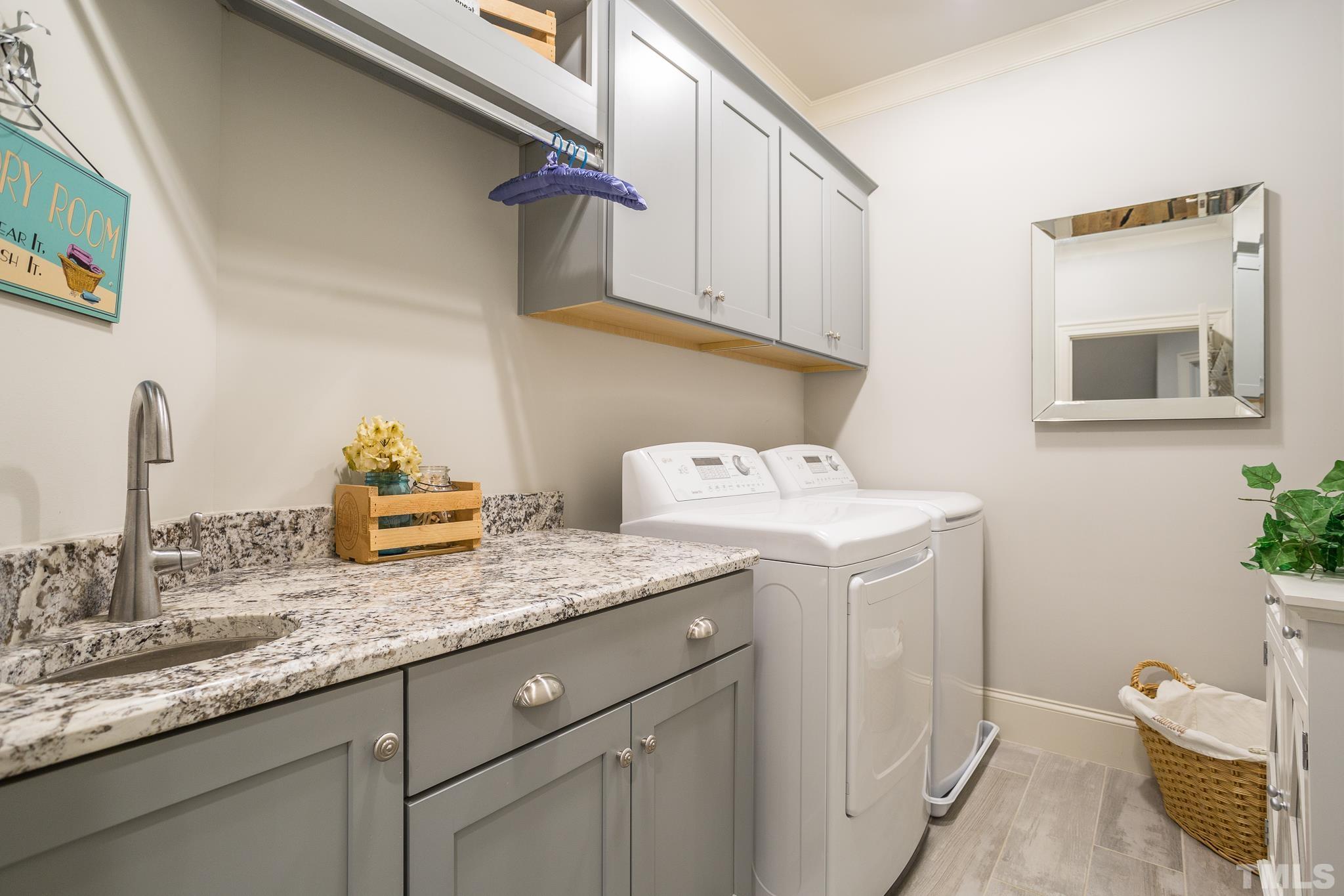 1921 Banbury Road Raleigh, NC 27608 - Photo 22 of 30 a bathroom with a sink and vanity