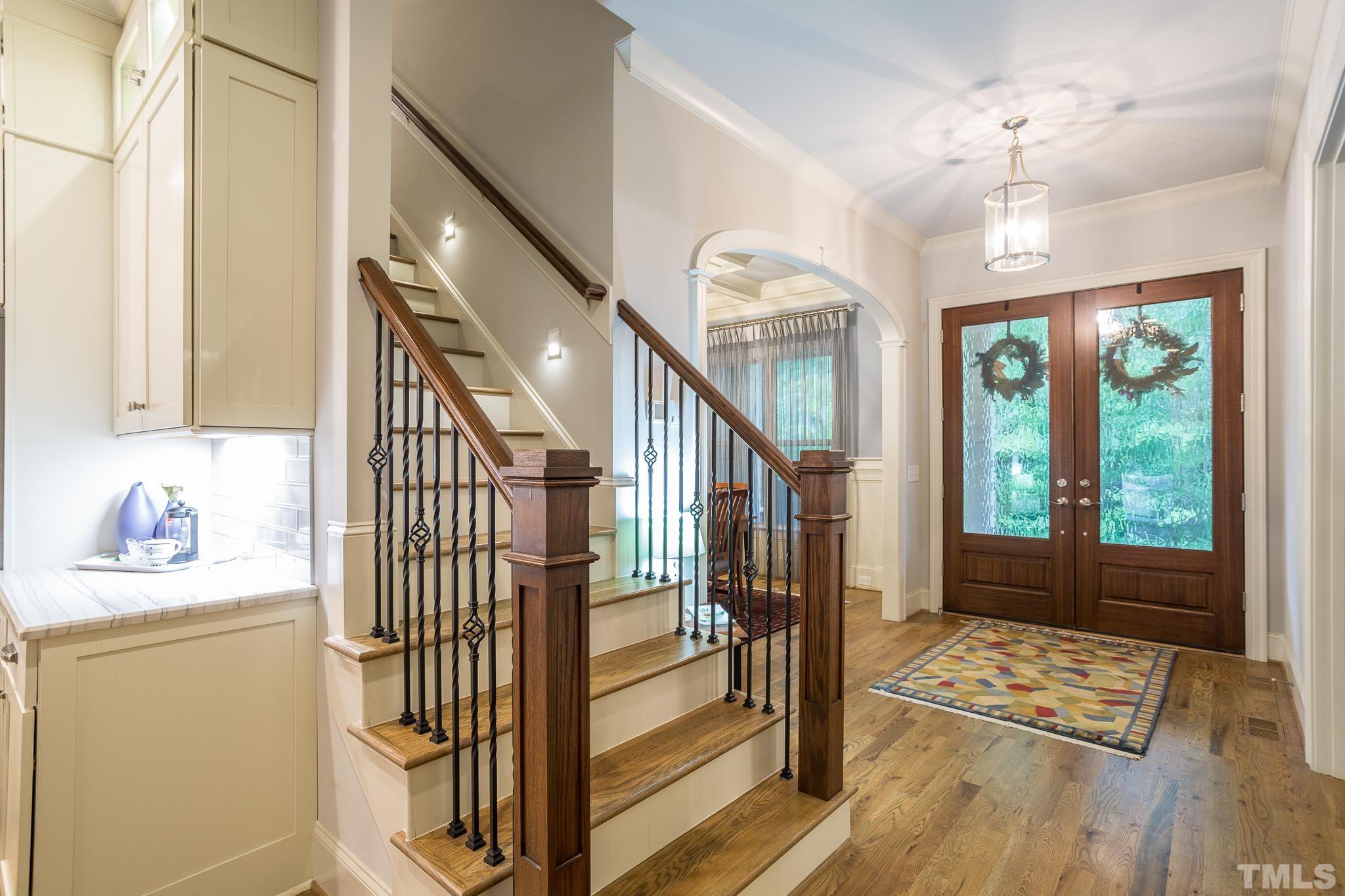 1921 Banbury Road Raleigh, NC 27608 - Photo 7 of 30 a view of entryway with wooden floor and livingroom