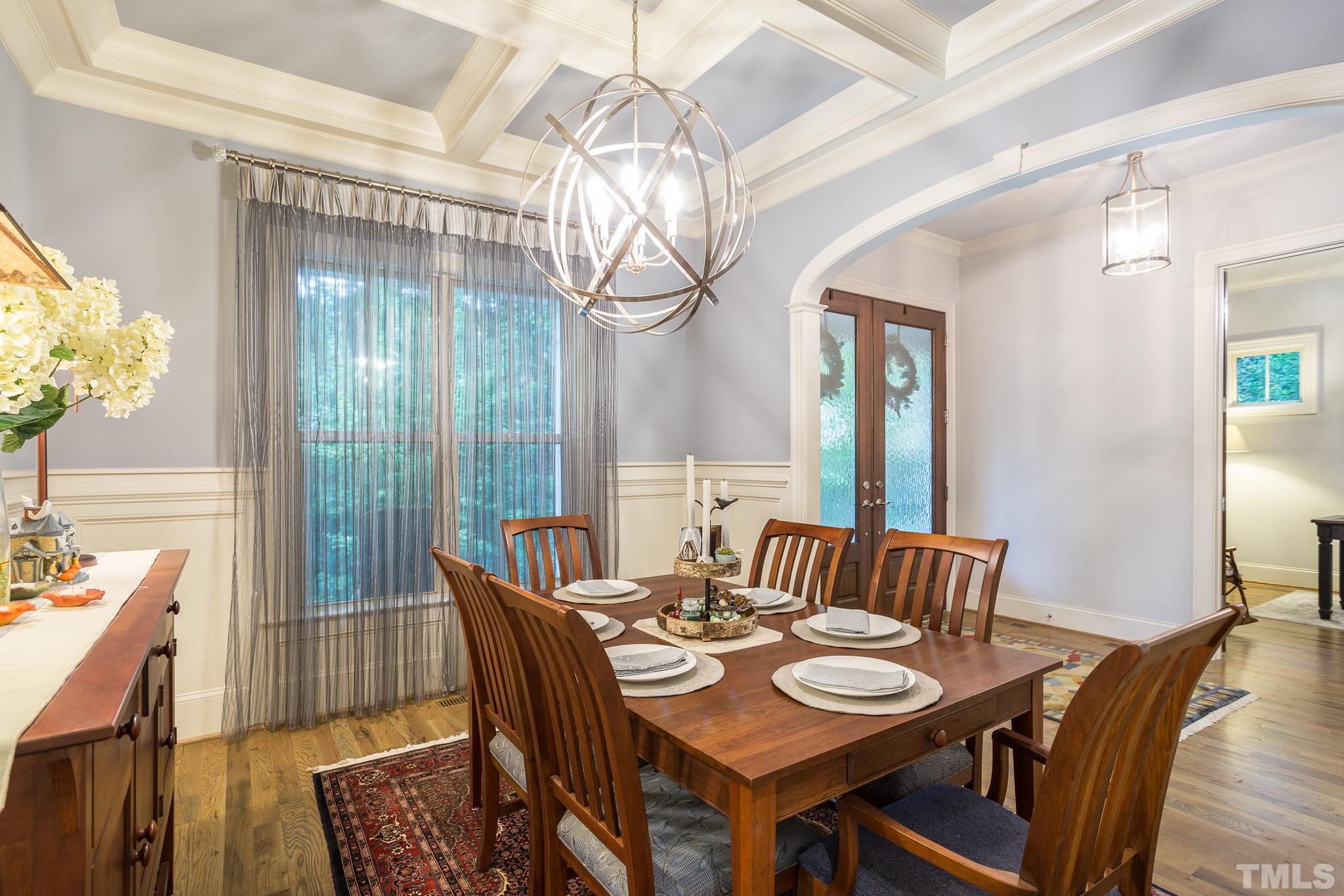 1921 Banbury Road Raleigh, NC 27608 - Photo 9 of 30 a view of a dining room with furniture window and wooden floor