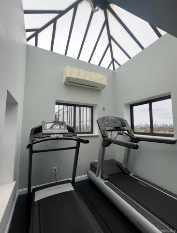 a room with chair and window