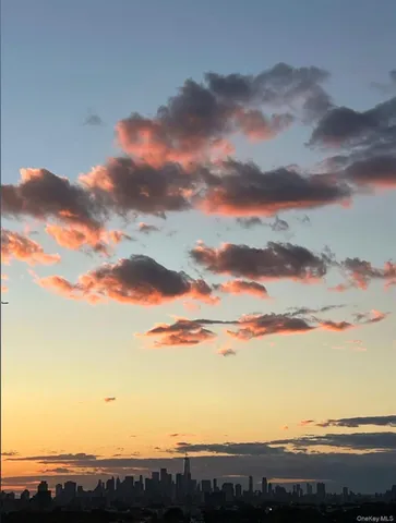 a view of a street with a building in front of it