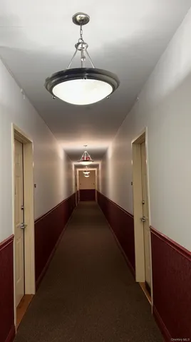 a very nice looking room with a ceiling fan