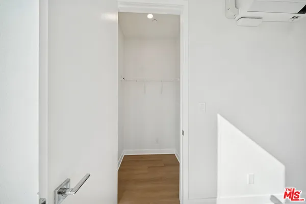 a view of a chair and table in the patio