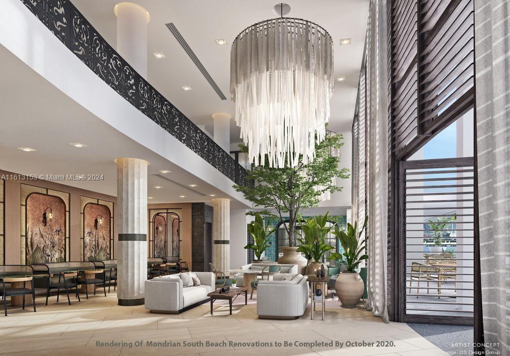 1100 West Avenue, Unit 1626 Miami Beach, FL 33139 - Photo 25 of 28 a lobby with furniture and potted plants