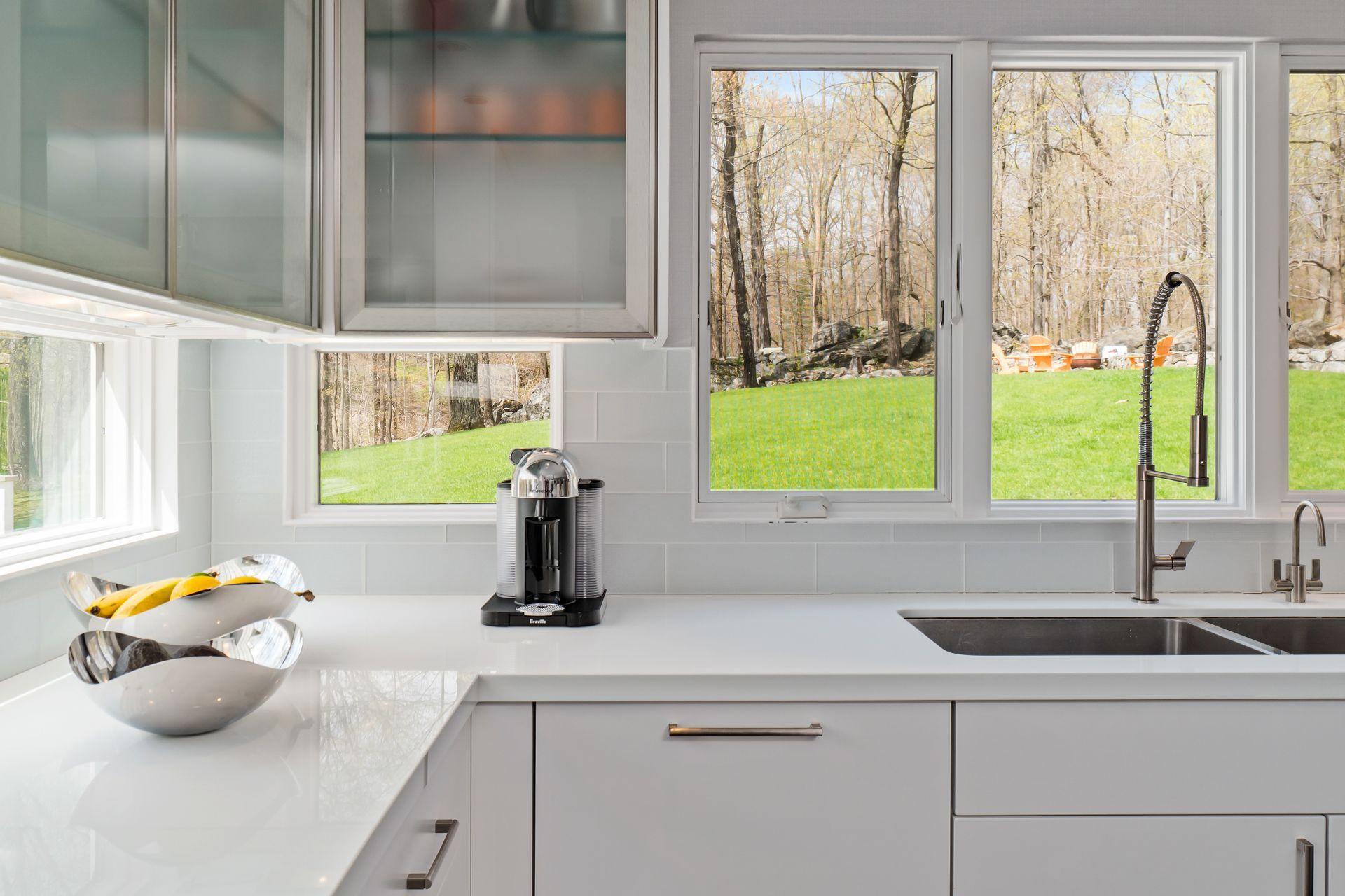 38 Farview Farm Road Redding, CT 06896 - Photo 12 of 34 a kitchen with a sink and a window