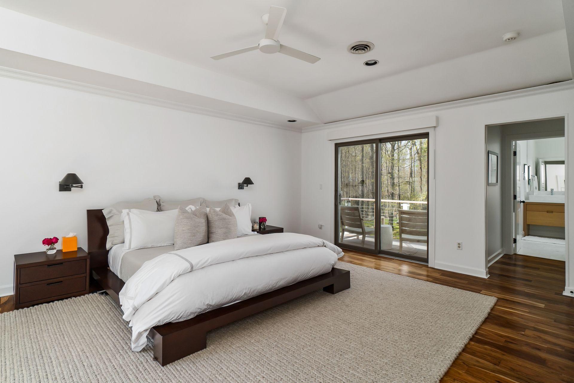 38 Farview Farm Road Redding, CT 06896 - Photo 16 of 34 a bedroom with a bed and a large window