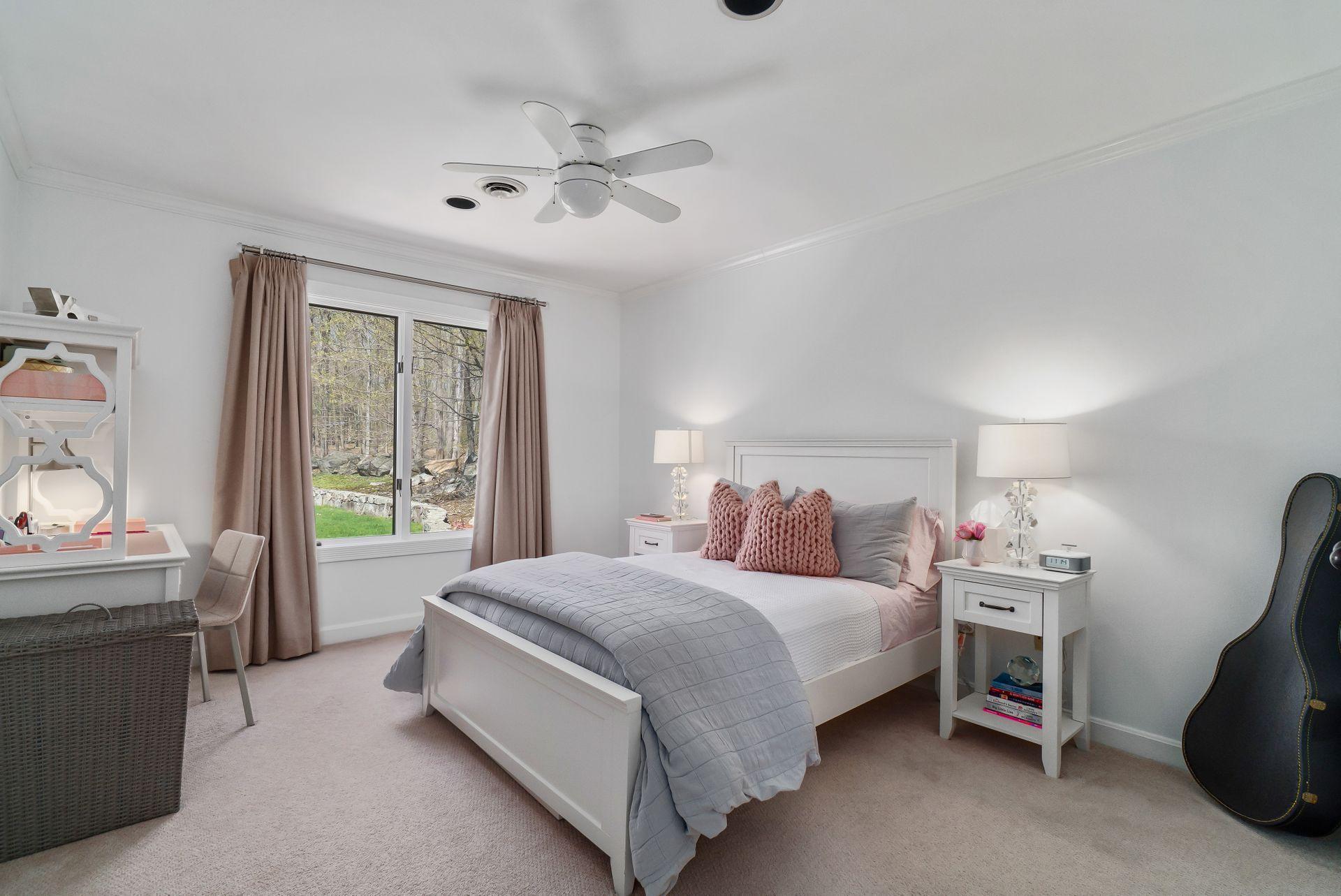 38 Farview Farm Road Redding, CT 06896 - Photo 20 of 34 a bedroom with a bed and a window