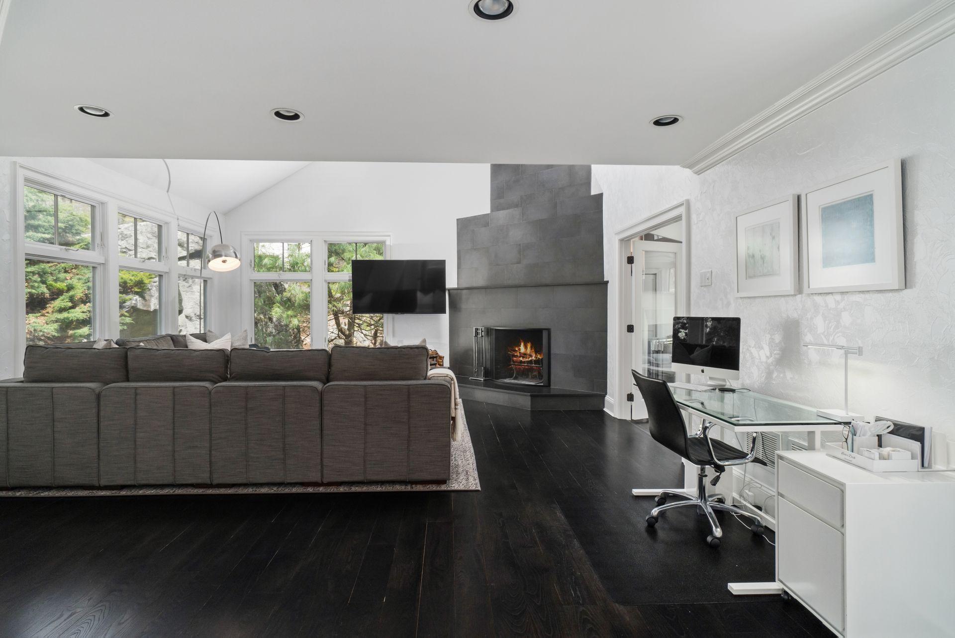 38 Farview Farm Road Redding, CT 06896 - Photo 7 of 34 a living room with furniture and a fireplace