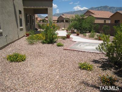 15042 North Pelham Road Tucson, AZ 85739 - Photo 8 of 10 a front view of a house with a yard
