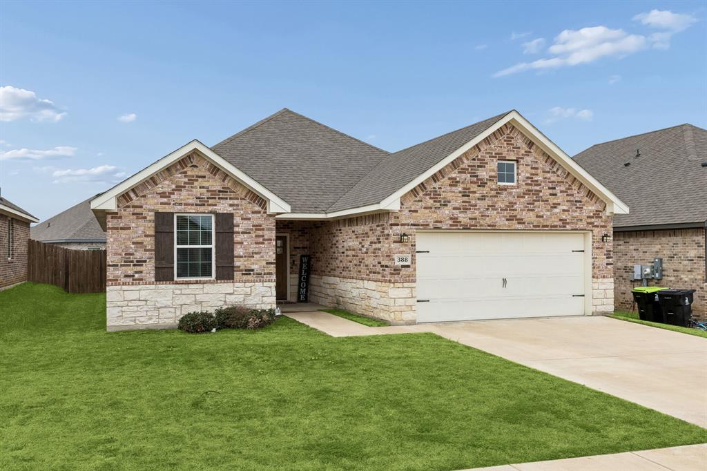 388 Montague Street Pilot Point, TX 76258 - Photo 2 of 28 a view of a house with a yard