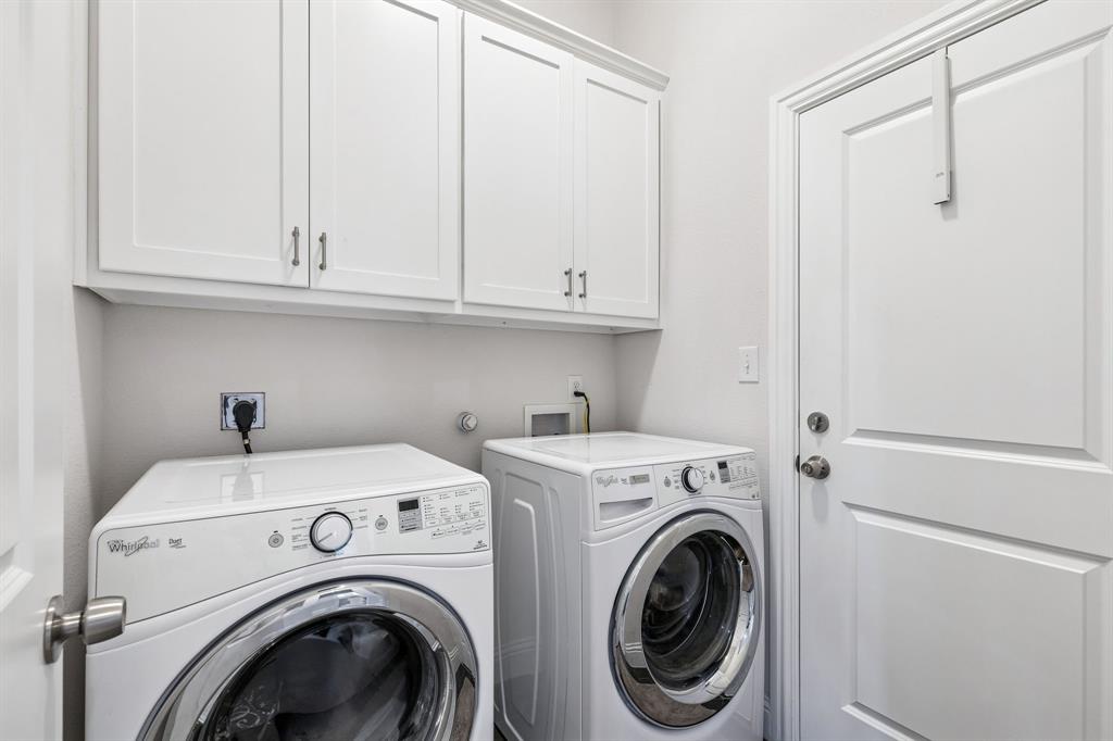 388 Montague Street Pilot Point, TX 76258 - Photo 25 of 28 a utility room with dryer and washer