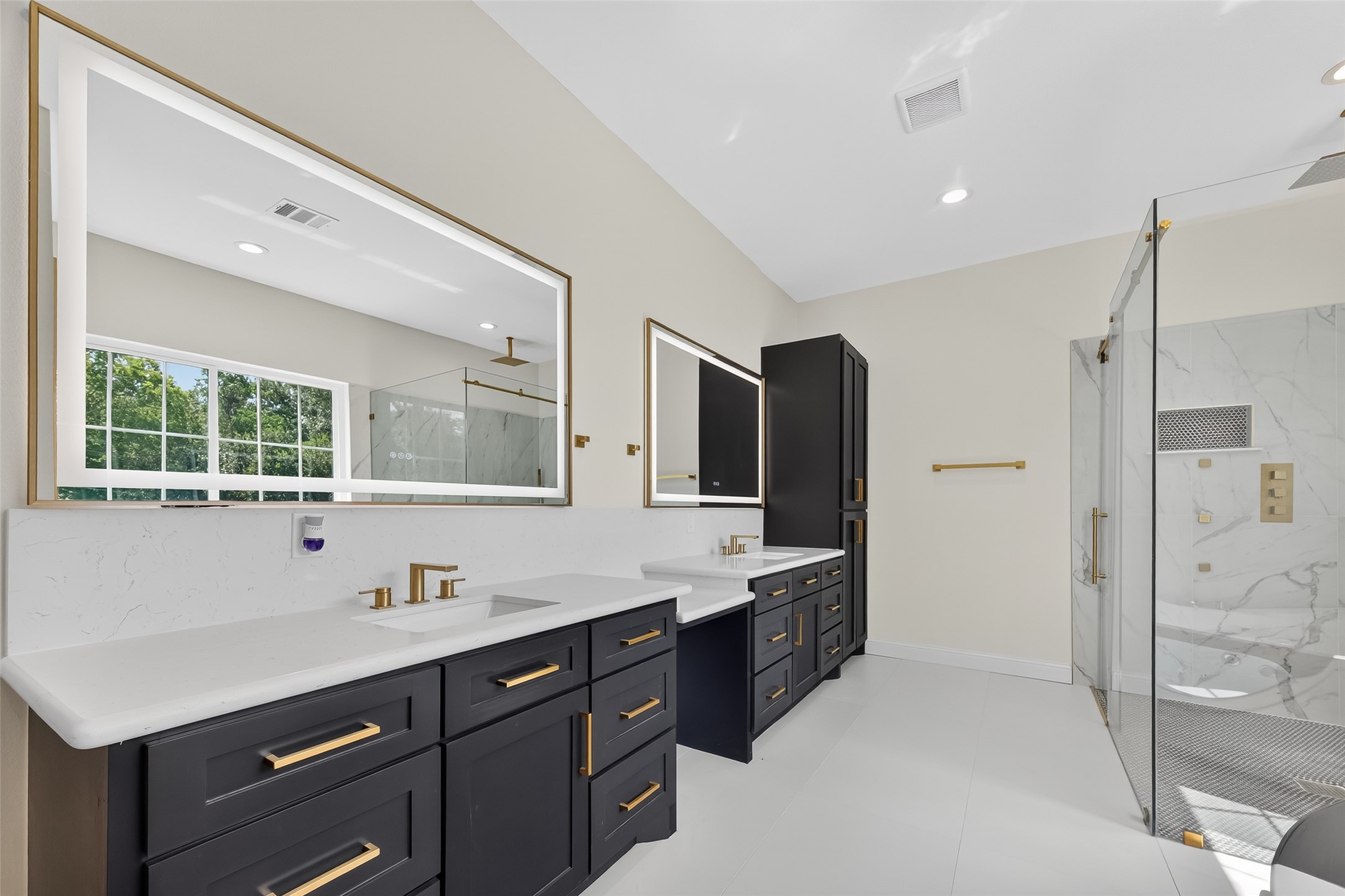 7717 Prairie Street Hitchcock, TX 77563 - Photo 26 of 43 Luxury LED Mirror – 60" x 40" gold-framed design with front/back lighting, stepless dimming, anti-fog, shatterproof glass, and 3-color memory.