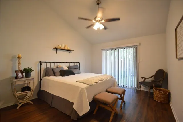 a bedroom with a bed and furniture