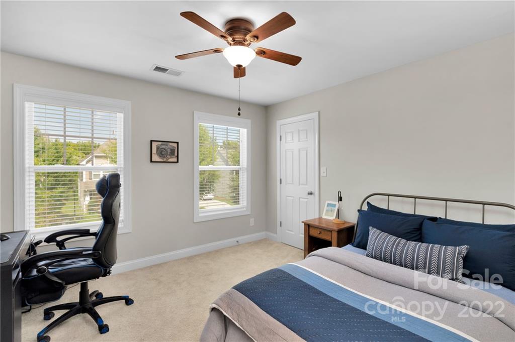 1640 Ridgehaven Road Waxhaw, NC 28173 - Photo 23 of 36 a bedroom with furniture and a window