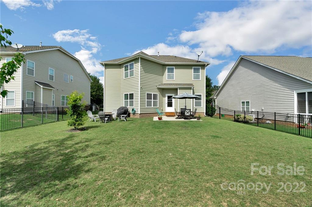 1640 Ridgehaven Road Waxhaw, NC 28173 - Photo 26 of 36 a view of a house with backyard and porch