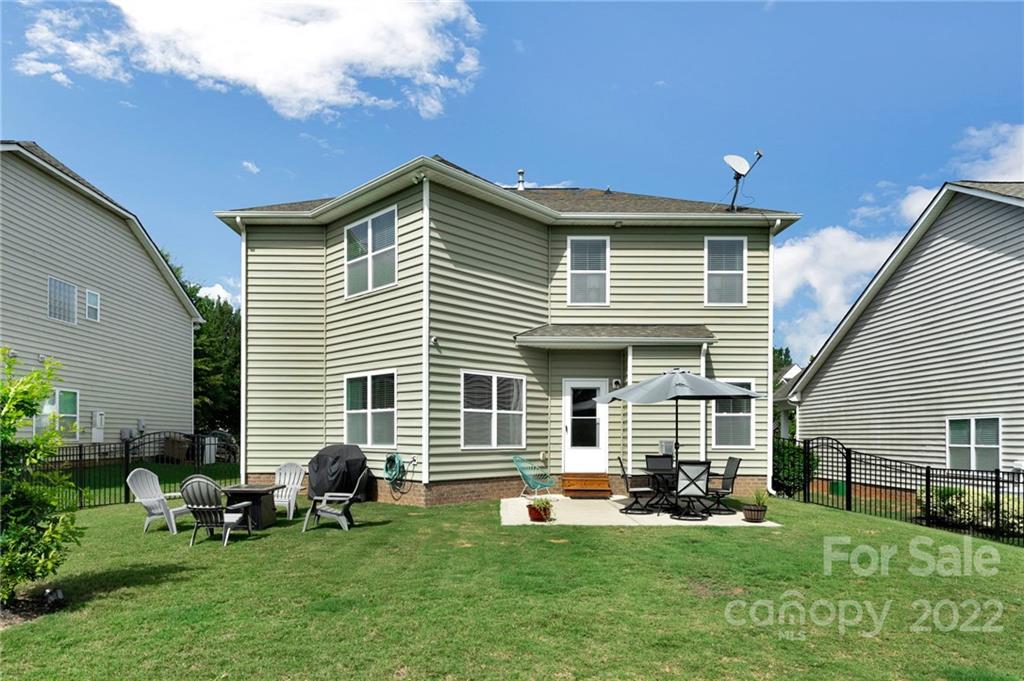 1640 Ridgehaven Road Waxhaw, NC 28173 - Photo 27 of 36 a front view of a house with a garden