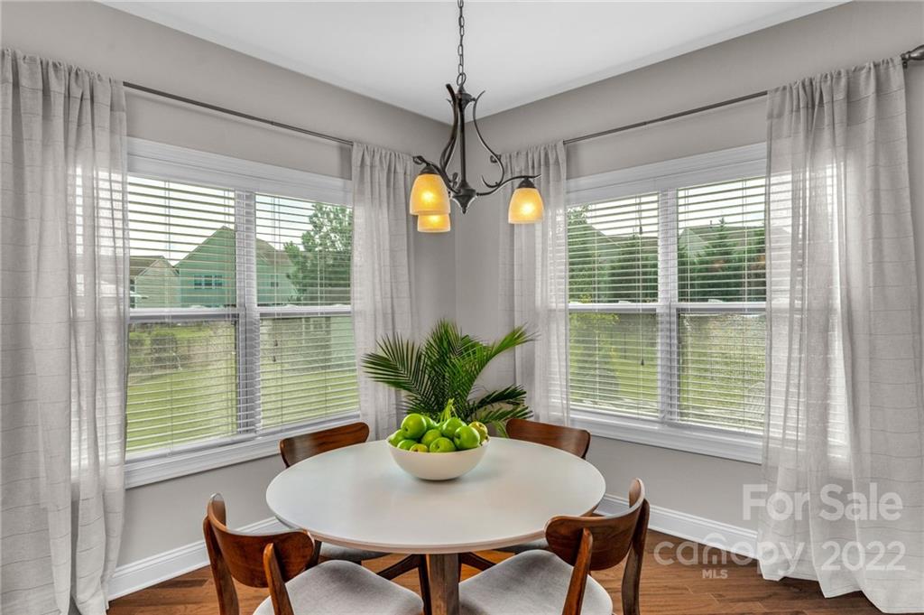 1640 Ridgehaven Road Waxhaw, NC 28173 - Photo 10 of 36 a view of a dining room with furniture and a window