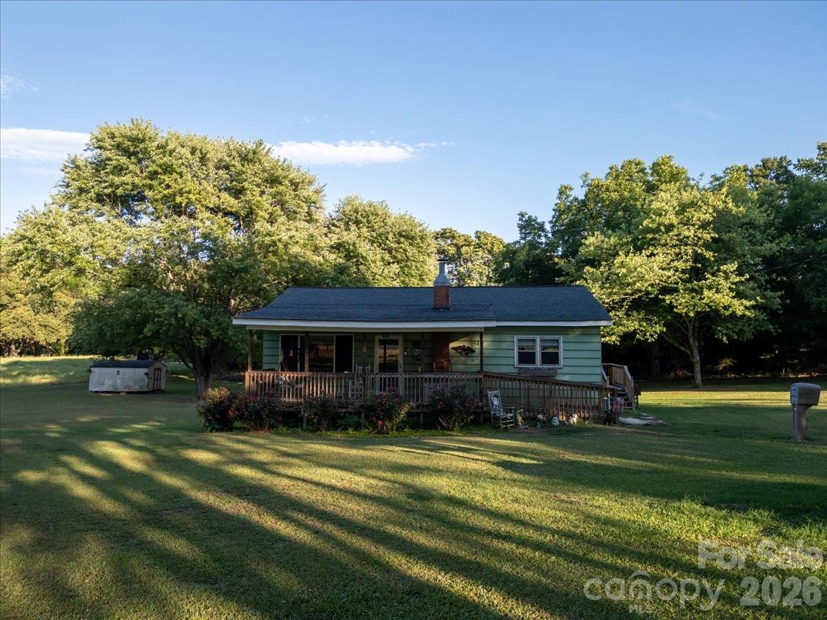 12282 Coyle Road Stanfield, NC 28163 - Photo 24 of 24 front view of a house with a big yard