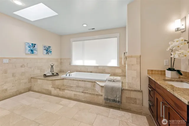 a bed room with a bed and a window