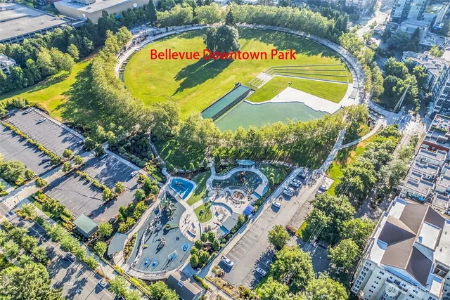 a front view of a house with a garden and patio