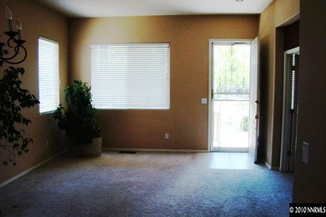 1671 Ashworth Court Reno, NV 89521 - Photo 7 of 13 a view of an empty room with a window
