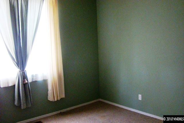 1671 Ashworth Court Reno, NV 89521 - Photo 8 of 13 a view of an empty room and a window