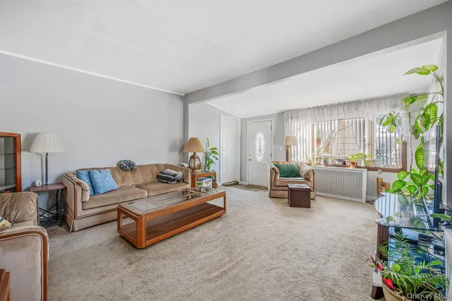 a living room with furniture and a couch
