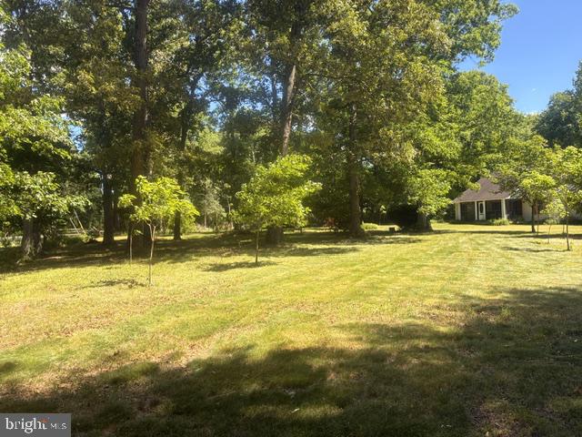 242 Firetower Road Camden Wyoming, DE 19934 - Photo 9 of 14 a view of a swimming pool with an outdoor space