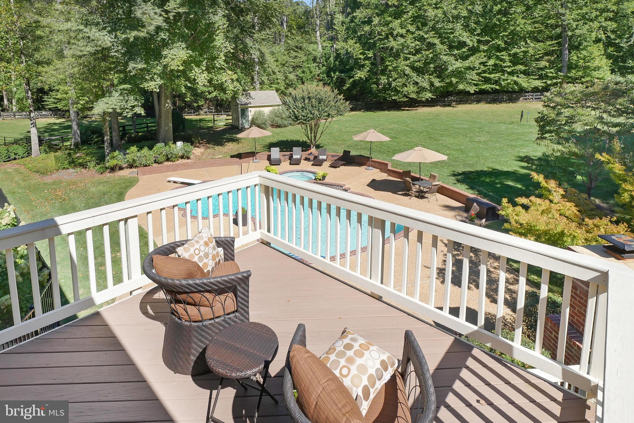 7407 Willowbrook Road Fairfax Station, VA 22039 - Photo 26 of 55 Upper level balcony off primary suite