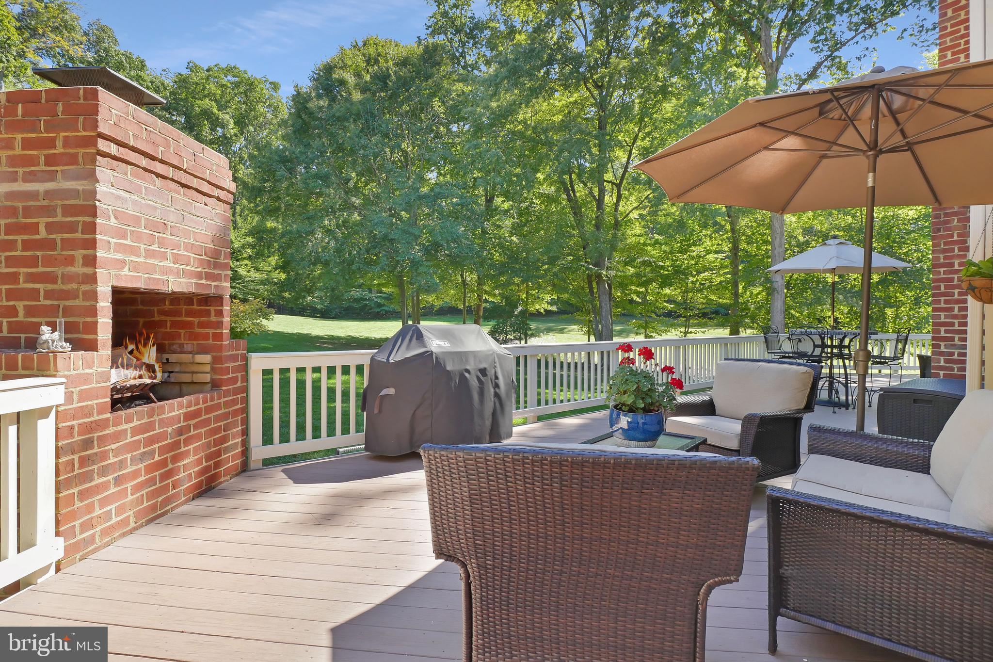 7407 Willowbrook Road Fairfax Station, VA 22039 - Photo 43 of 55 Deck features chimney for cozy fires