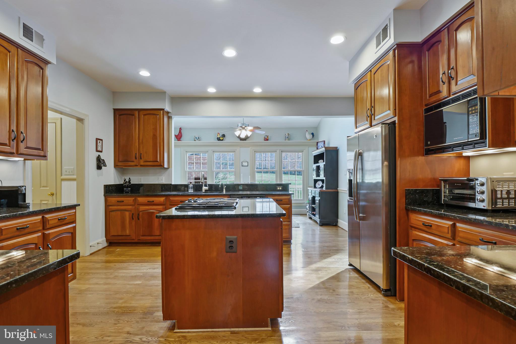7407 Willowbrook Road Fairfax Station, VA 22039 - Photo 8 of 55 View through kitchen to sunroom
