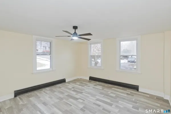 a view of an empty room and window