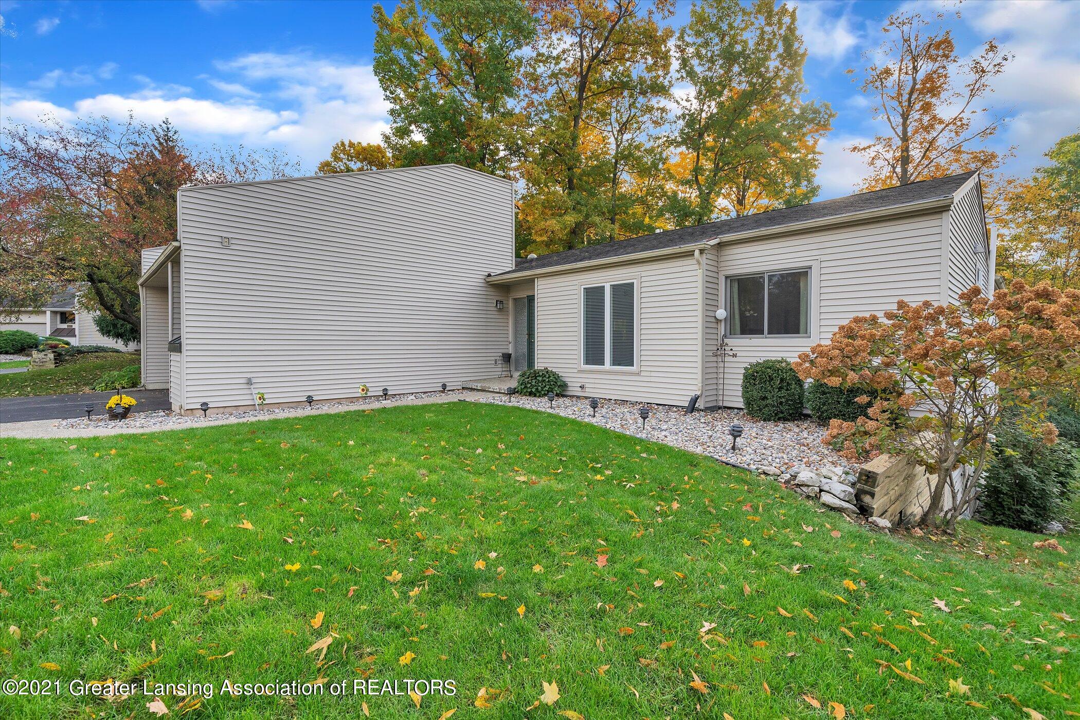 7017 North Ridge Road, Unit 28 Lansing, MI 48917 - Photo 4 of 34 04-7017-N-Ridge-Rd-Windowstill-Real-Esta