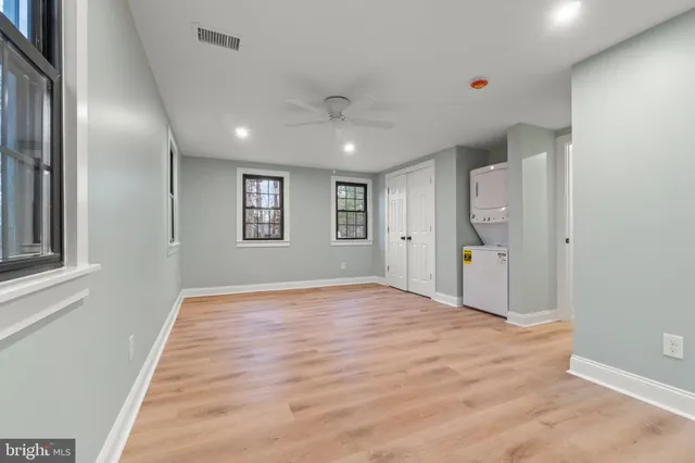 a view of an empty room and window