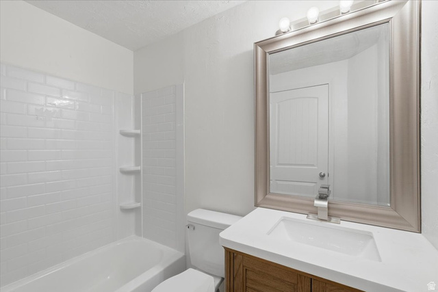1218 Moonlight Drive Elk Ridge, UT 84651 - Photo 34 of 44 Full bath with vanity, bathing tub / shower combination, and a textured ceiling