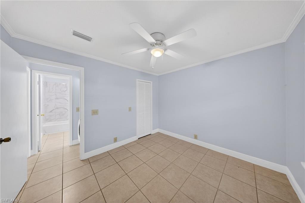 5300 Treetops Drive, Unit I206 Naples, FL 34113 - Photo 9 of 17 a view of an empty room