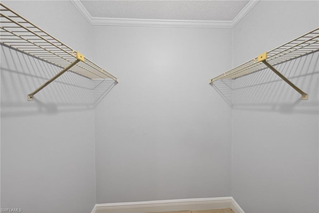 5300 Treetops Drive, Unit I206 Naples, FL 34113 - Photo 10 of 17 a view of small space with empty racks