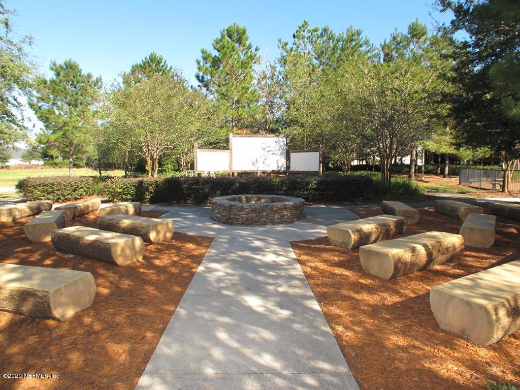 816 Crystal Spring Way St. Augustine, FL 32092 - Photo 38 of 44 a view of a patio with swimming pool