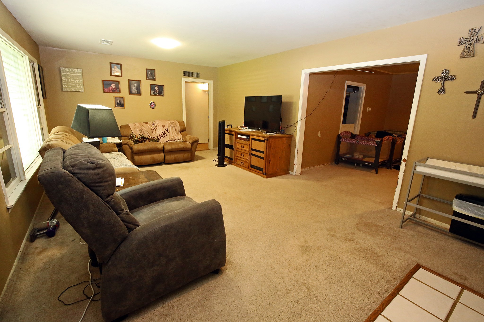 4406 FM 646 Road Santa Fe, TX 77510 - Photo 4 of 26 Living Room that flows into the Den/Dining Room