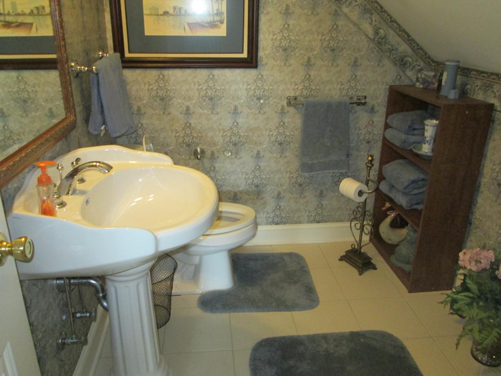 2409 Jack Teasley Road Pleasant View, TN 37146 - Photo 23 of 30 Half bath conveniently located in the 2nd floor Bonus Area.