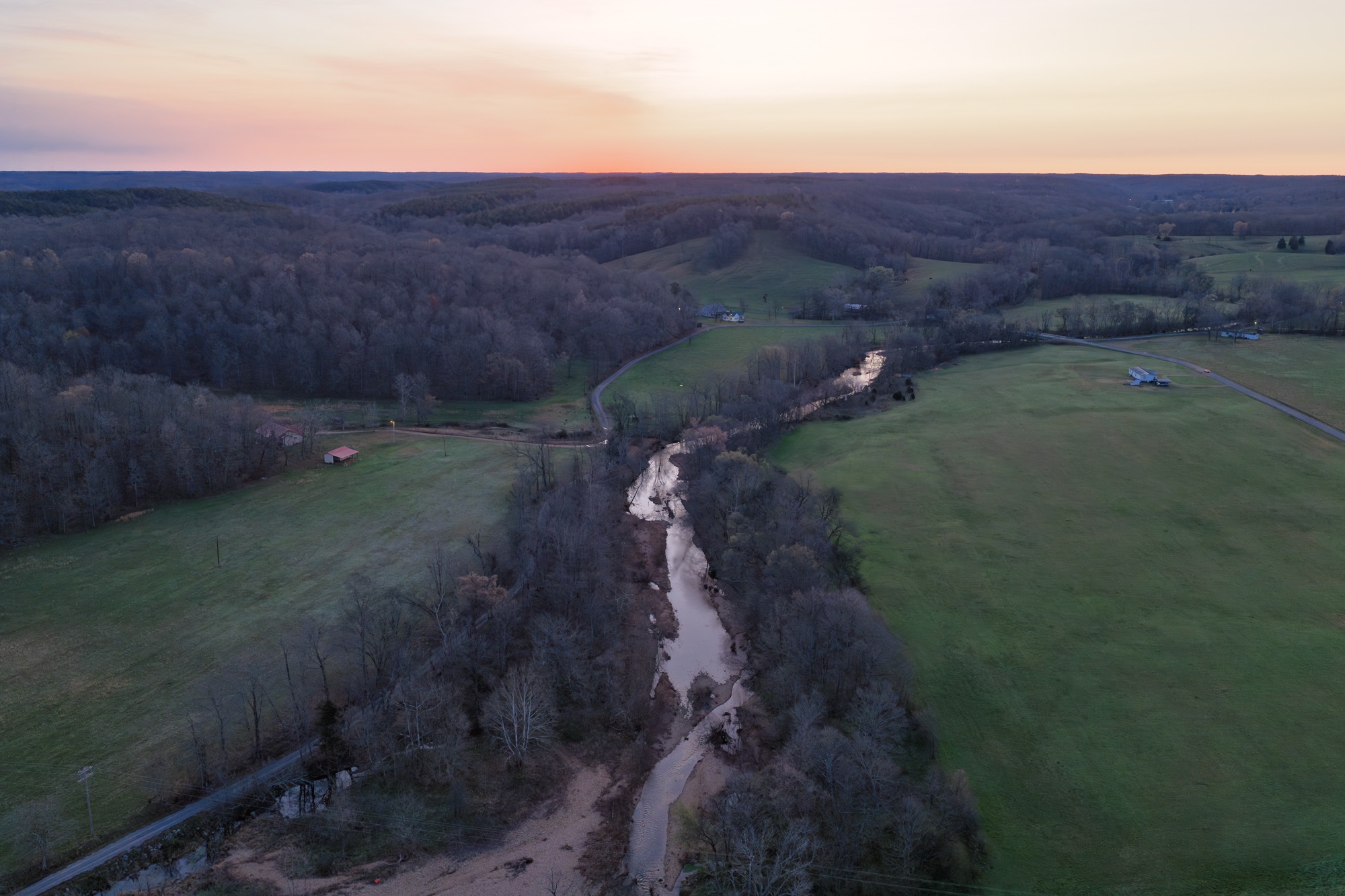 a view of a backyard with green space